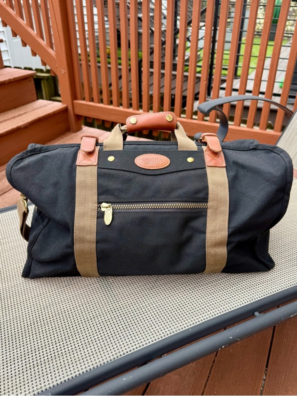 Dakota by Tumi Ballistic Nylon and Leather Duffel Bag, Black, 21”x14”